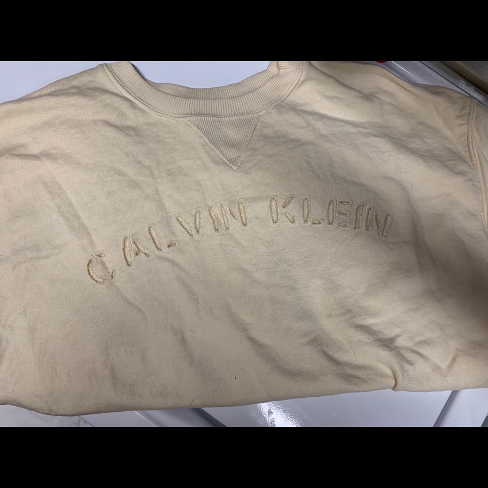 yellow calvin klein shirt
